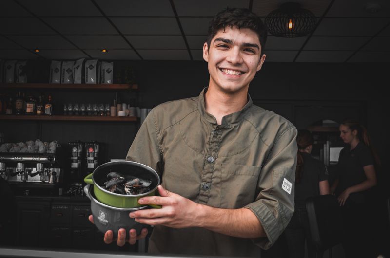 Head chef at Dave's hot chicken preparing signature dishes